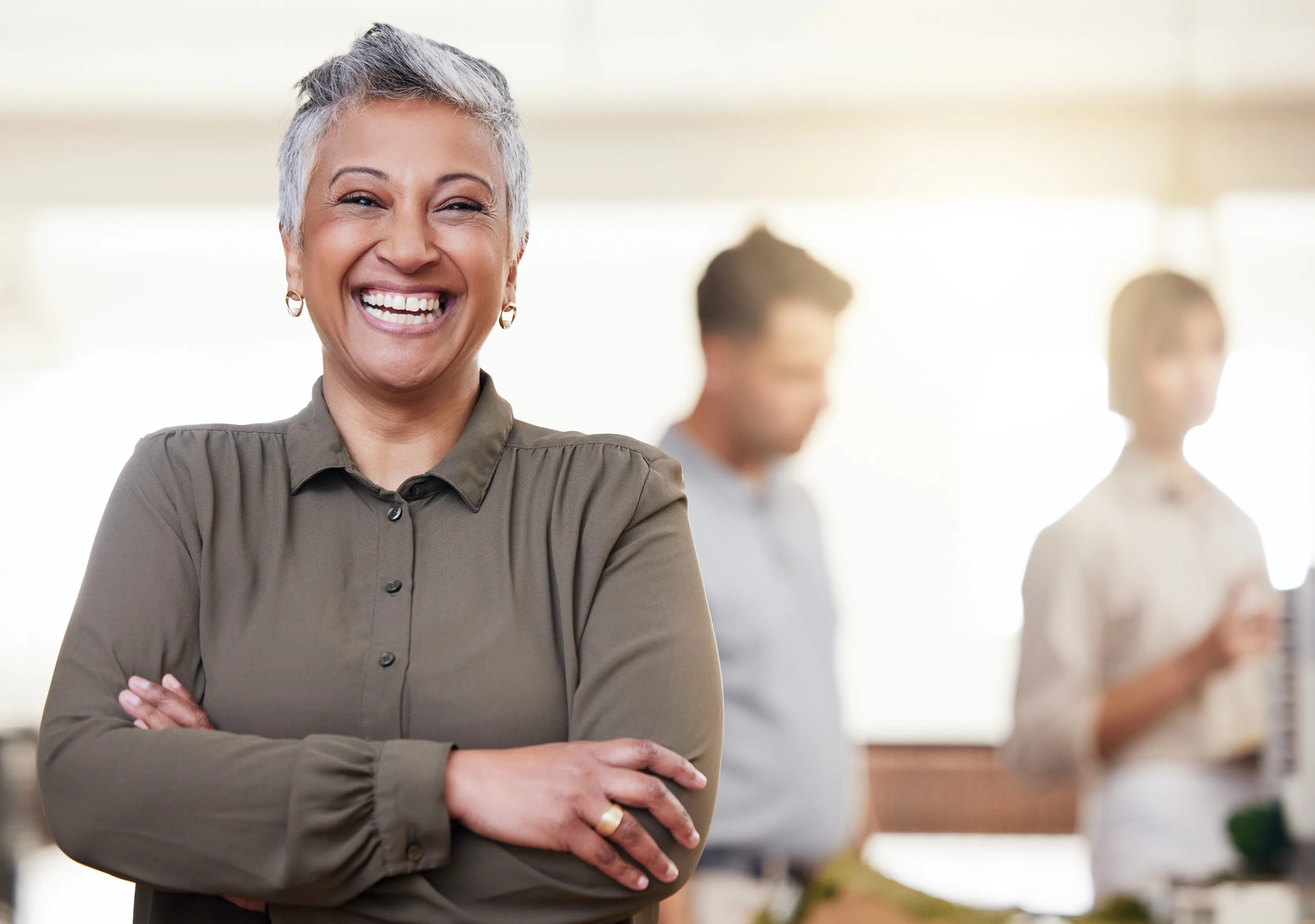 A smiling Global Coach Group leadership coach