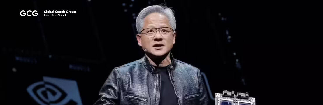 Jensen Huang speaking on stage as an AI industry leader